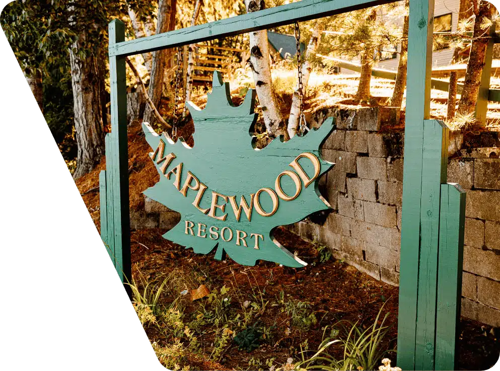 Main entrance sign for Maplewood Resort